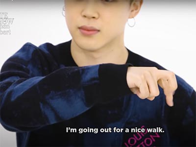 BTS hand gesture "walking"